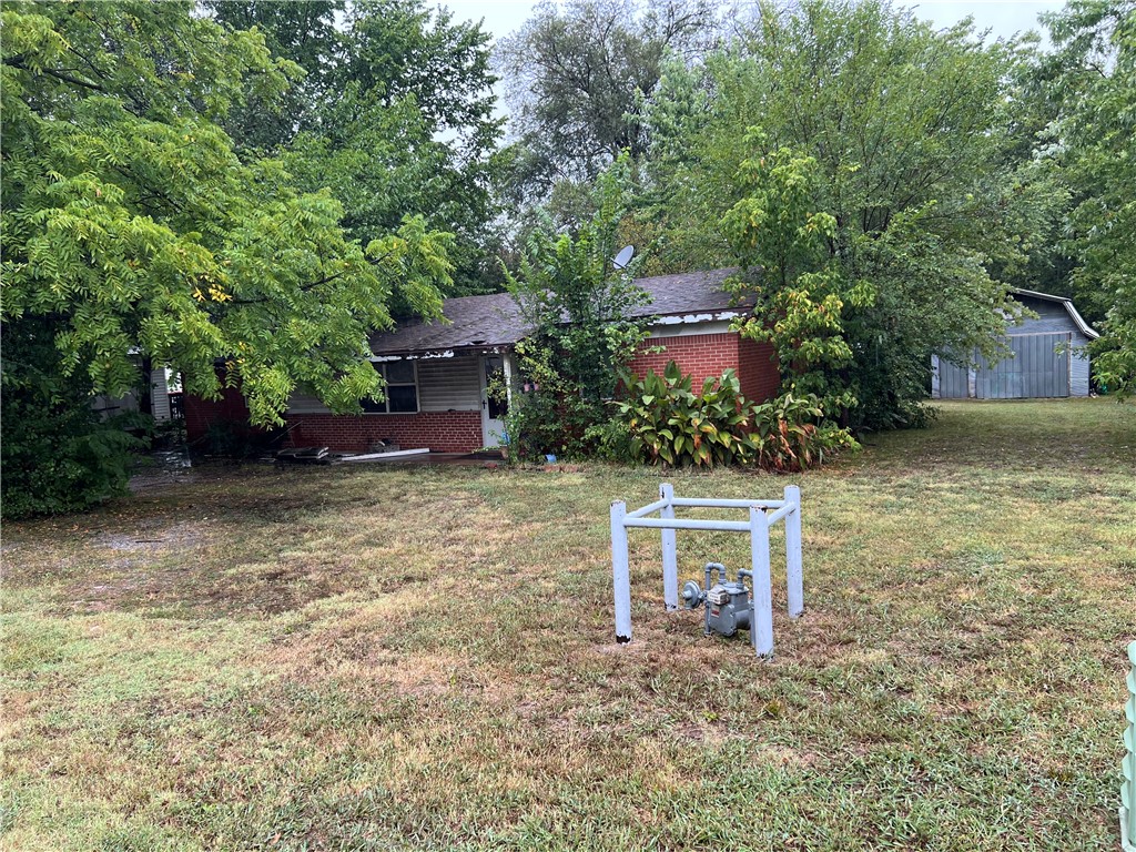 Investment opportunity!! 4 bdr 2 ba fixer upper on .22 acre lot. Was once a duplex and could be converted back. Already has two water heaters and a matching floorplan on each side. Zoning will need to be changed for multi-family. Sold "as is" with no repairs.