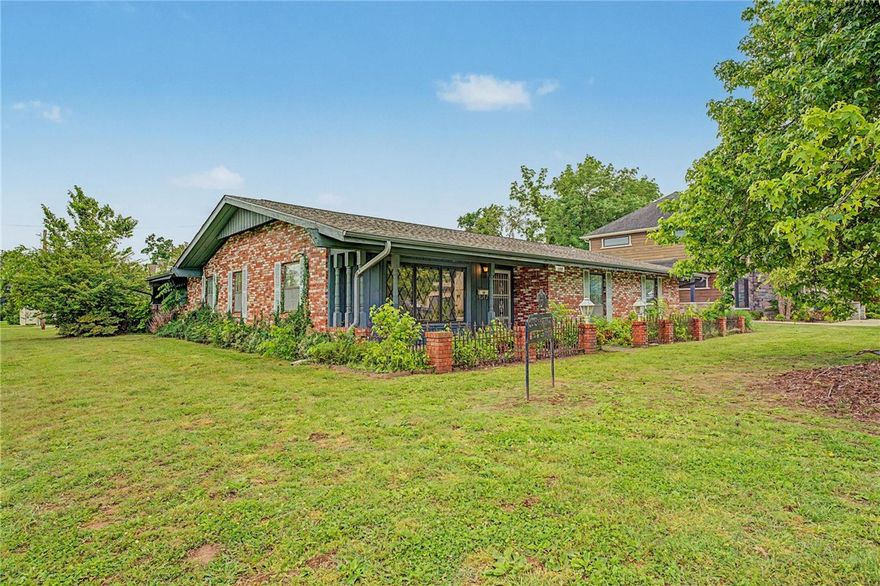 608 NW B St offers an exceptional location in the heart of Bentonville just minutes from Downtown, Crystal Bridges, and the Slaughter Pen trail system. Situated on a desirable corner lot with alley access, the property offers added flexibility and strong long-term potential for future expansion, redevelopment, garage access, or additional improvements.

This well-maintained home has had only two owners and has been cared for over the years, including a newer roof installed in recent years. The flat backyard features mature perennial landscaping and plenty of usable outdoor space.

Whether you’re looking for a primary residence, investment property, or future build opportunity, it’s hard to beat this location and lot in one of Bentonville’s most desirable areas.