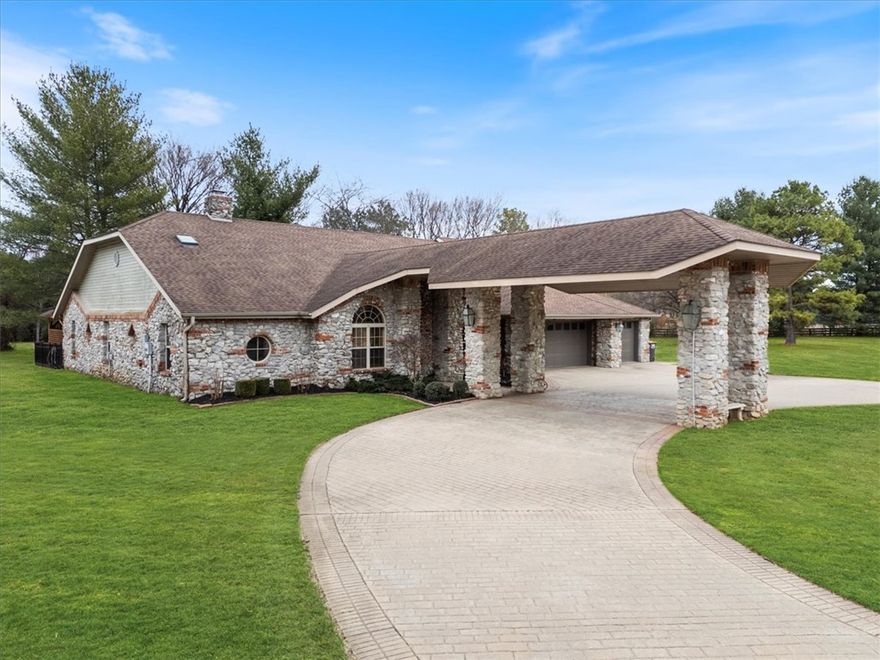 Are you ready for an updated one-level home situated on 2 acres in a gated community that boasts character and design? Located in East Fayetteville's community of Goshen and the Fayetteville school district, this 4-bedroom home is well laid out with a formal dining space, 2nd living space, heated and cooled sunroom and a newer pergola and outdoor living area. Walk to White River to fish or walk to the community pool/basketball courts. Updates galore, including new carpet (coming soon), a new roof in 2025- see attached list. Fun Fact: this home was in the Parade of Homes in 1997 - of course it has been updated now! (seller credit available with acceptable offer)
