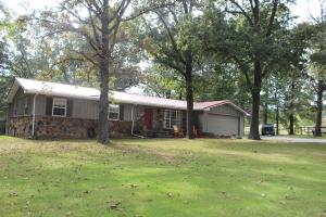 Get a peaceful, easy feeling.If you've seen this house and land driving by you've probably wished it was yours. This beautiful 3 BR 3 BA home planted on 6.6 parklike acres.His and hers master baths.Newer appliances and roof.Beautiful Deck.Fenced, pond, outbuildings, mature trees and walking paths. This is a dream home in a dream location. Info per County Data. Age is effective age.