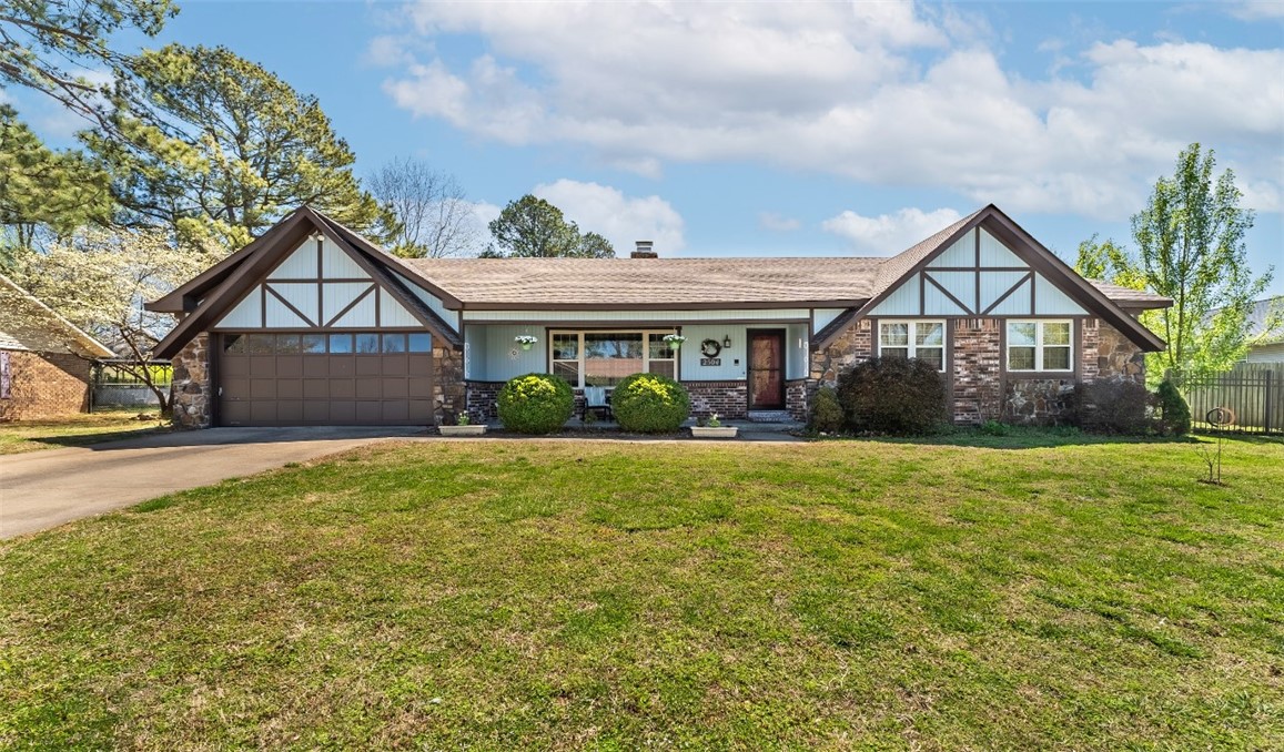 .35 acres in prime location! Quiet neighborhood just around the corner from trail access and less than 2 miles to hop on I49. All new vinyl windows (w/transferrable lifetime warranty) and vinyl plank flooring, new water heater in 2023, double oven, double sided fireplace for those cozy winter nights and a backyard to build your dream garden or pool! Oversized 2 car garage has tons of built in storage, fiber internet available. The possibilities are endless, come and see! (Back on market at no fault of seller). Kitchen has new paint.