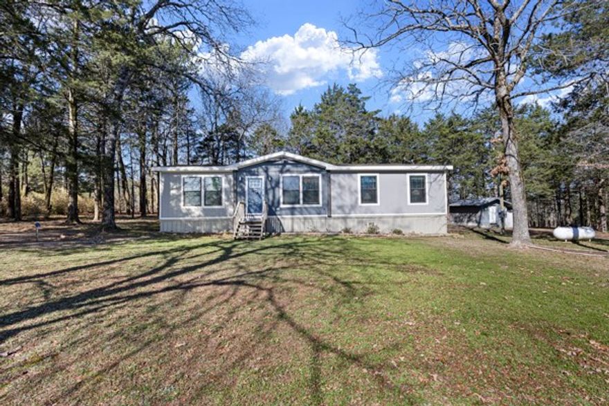 Unique opportunity featuring two manufactured homes on separate acreage offering flexibility for multi-generational living or potential investment use. The primary residence is a 2023 double wide manufactured home with 3 bedrooms and 2 bathrooms, featuring a modern farmhouse-style interior, spacious layout, and walk-in closets. The home also includes a backup generator and a detached storage building. This residence sits on approximately 1.46 acres.

The second residence is a 3 bedroom, 2 bathroom single wide manufactured home situated on approximately 1.01 acre. Improvements include a 24x20 shop, an attached storage area, and a greenhouse, providing excellent space for hobbies, storage, or gardening.

This property offers the potential to purchase both homes together as a package, with the possibility of selling separately.