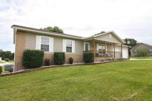 FANTASTIC LOCATION FOR THIS WONDERFUL HOME ON A BIG, CORNER LOT! Sitting on almost an acre in the Bergman School District, this 4BR/3BA home has over 2600+ sq.ft, TONS of Amenities, & a full, finished walk-out basement! IMMACULATE Kitchen w/ tons of beautiful features, boasts Granite Countertops, Oak Hardwood Floors, Custom Cabinets w/ Extra Outlets throughout & a Walk-In Pantry! HUGE Deck off of the Kitchen/Dining is Perfect for that BBQ w/ Friends & Family! 4th Bedroom in Basement has a Full Bathroom Attached! Basement also has a Large Rec Room/Gym Area as well as a great Man Cave/Craft Room space! 3rd Car Garage in Basement is an excellent Workshop area for any of life's many projects! Superb Garden spots along with Apple, Pear, Peach, & Pecan Trees! See Supplement Tab for More!