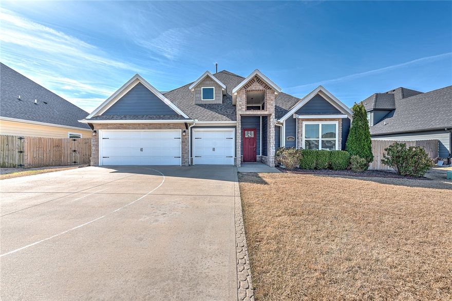 Meticulously cared for, exceptionally clean and move-in ready! This cozy craftsman charmer offers an elevated sense of home the moment you step inside. Sunlit rooms, exposed beams, and a beautiful craftsman staircase create a warm, refined backdrop for daily living. The wide-open floor plan flows easily for quiet moments or large gatherings. Designer finishes, granite countertops, like-new kitchen appliances, central vacuum, custom blinds, and a well-appointed laundry room and drop zone blend comfort with sophistication. Storage is abundant with attic space, a huge 3-car garage/workshop, and an insulated outdoor storage area with custom built-ins. The 4-bed, 3-bath layout includes a dreamy primary en-suite retreat. Outside, a large patio and fully privacy-fenced backyard invite relaxed mornings and elegant evenings. Beautiful landscaping, a new roof (July 2025), and a friendly, well-kept neighborhood complete the picture. Walk to Gamble Elementary and Bentonville West, with quick access to I-49 and downtown.