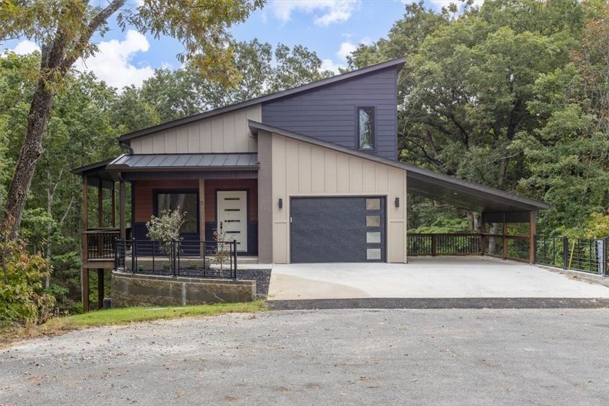 Discover modern living at the edge of adventure! This contemporary home sits just steps from the Back 40 Trail System—perfect for biking, hiking, and exploring Bella Vista’s scenic outdoors. Inside, you’ll find an open layout with beautiful kitchen cabinetry, (washer & dryer included), a finished basement for flexible living, and a covered deck with peaceful wooded views. Whether you’re an outdoor enthusiast or simply love quiet mornings surrounded by nature, 5 Hart Lane offers the best of both worlds—style and serenity, minutes from everything Bella Vista has to offer.