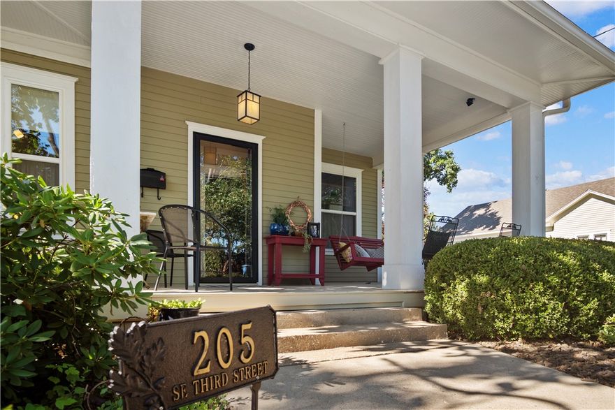 Live. Work. Play. Imagine living where you love and playing where you live. This is a rare opportunity to buy a piece of Downtown Bentonville history in the heart of the Historic 3rd Street District, just steps from the Downtown Square, The Ledger, The Momentary, the new Walmart campus, Crystal Bridges and the new Quilt of Parks currently being constructed (https://bentonvillear.com/1210/The-Quilt-of-Parks). Just off the corner of SE 3rd and A St. this recognizable home with its large front porch and famous red porch swing provide an amazing opportunity for work/life balance. Built in 1920 and once the residence of the Compton family, this home was thoughtfully remodeled in 2010 to preserve its historic charm. It features original hardwood floors repaired and refinished, lath and plaster walls, exquisite wood moldings, and a beautifully refinished corner brick fireplace and mantel. This home is bathed in natural light and makes coming home to Downtown Bentonville delightful!