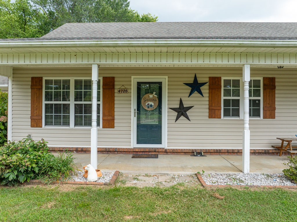 Would you love to be far enough out of the city to see the stars at night and hear the crickets in the evening, but still be close to I49 and I40? Check out this Recently updated 4 Bedroom + an office, 2 bath home on 9+ fenced and cross fenced acres. New kitchen appliances. Custom walk in shower, large whirlpool tub, and walk in closet in the primary bedroom. Large, covered front porch. Room for your animals with 3 pastures, and a chicken coop. A 1500 sq ft workshop for your hobbies or toys. So much to see, motived Seller!