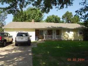 Spacious 3 bedroom 21/2 bath home, new roof & siding in last 6 years. Covered deck, large shade trees, hardwood floors, French doors to deck, spacious rooms, separate dining room, gas log fireplace. Family room could be office or 4th bedroom. Siding is Hardiplank.