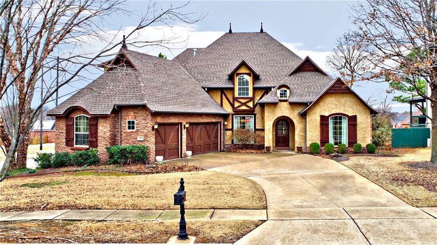 This stunning 3,607 sq. ft. European-inspired home on a corner lot in Copper Creek offers luxury and convenience. Located across from the Botanical Gardens  with Razorback Greenway access, it features 4 bedrooms, 3.5 baths, and a 3-car garage. The main level primary suite includes a walk-in shower, Jacuzzi tub, dual vanities, private water closet, and large walk-in closet. The gourmet kitchen boasts dark wood beams, custom cabinetry, granite countertops, a large island, gas cooktop with pasta filler, double oven, and a stucco vent hood, opening to a hearth room with a fireplace. Enjoy a formal dining room, private office, great room with built-ins & gas fireplace, plus a spacious deck overlooking a fenced backyard with a fire pit. Upstairs offers a bedroom suite, two additional bedrooms, a bonus room, and attic stoage. Schedule your tour today!