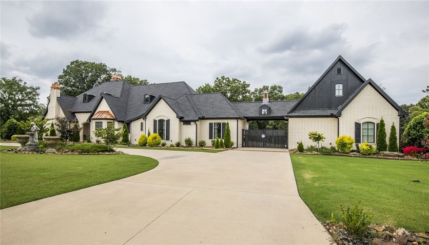 Exquisite custom built home nestled in 3+ acres mins from the WMHO. Luxurious finishes include Control 4,Thermador and Electrolux appliances, auto touch faucets, scratch proof sinks, and remote controlled window coverings.  Private guest house, automatic gate,Tornado Shelter. media room, 4 car garage, 4 ensuite beds on main level