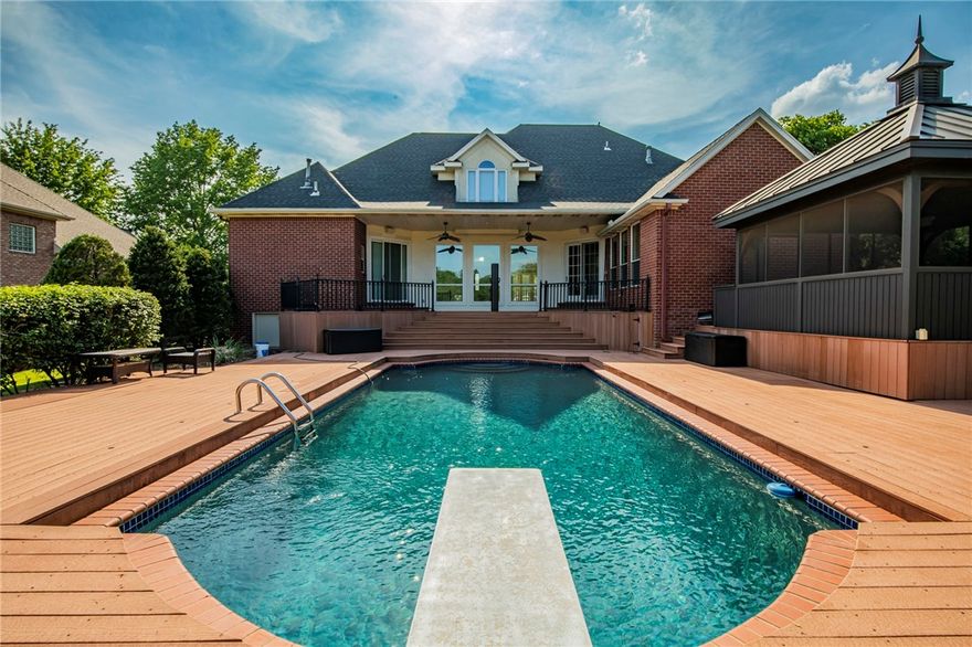 The Manors, one of the most desired neighborhoods has its newest listing! This agent-owned majestic beauty with the Razorback Greenway bike/run trails connected to the subdivision is on the market! Just under 4200 sq ft with an acre plus lot with a beautiful half circle driveway and a 4 car garage..a unicorn. The kitchen has restaurant-quality appliances and the deck is fully composite. This one checks all the room boxes with the executive office downstairs, with the primary bed downstairs with all new carpet throughout the home, some new fixtures, paint, and landscaping. The backyard, pool, and hot tub gazebo are the jaw-dropper on this adobe. You're right in the middle of SW Rogers. Chicken Fil A is a short drive. 
 https://maps.app.goo.gl/fmTLxAP1CzMhUvrS8 (this link takes to the correct address.)