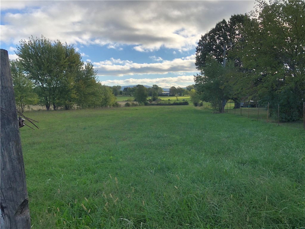 Here it is! A very hard to find 1.70 acres on Co Rd 19 Little Elm. Blacktop frontage. Very nice surroundings. Perfect for your dream home & shop. Great location half way between Farmington & Prairie Grove. Subject to lot split approval. More acreage available. See MLS 1258600