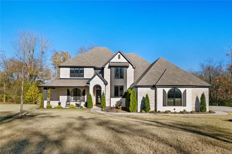 Welcome to Havenwood. This like-new, immaculate, 5 bedroom, 3.5 bathroom estate home sits on a 1.69-acre lot in one of East Fayetteville’s most sought-after neighborhoods. From the moment you enter, you will be amazed by the style of the open-concept modern layout with beautiful wide plank flooring. The living room flows seamlessly into the gourmet kitchen with an oversized quartz island and Wolf stainless steel appliances. The main floor features an office, luxurious primary suite with spa-like bathroom, huge walk-in closet, a large secondary guest bedroom with full bath, laundry, half bath, and walk-in pantry. Upstairs you will find 3 additional bedrooms or bonus room/flex space. Enjoy the outdoor covered patio with composite deck and 3 car side load garage. Close to everything NWA has to offer. Minutes to Sassafras Springs Vineyard and less than 10 minutes to the Fayetteville business district, Lake Fayetteville, University of Arkansas, and downtown Fayetteville. Please see attachments for additional information