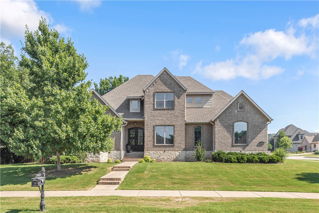 Welcome to this stunning corner lot home in the sought-after Stone Mountain subdivision! Conveniently located in east Fayetteville, this gem offers four bedrooms, each with its own ensuite bathroom and walk-in closet. With wood flooring in the living spaces, cozy carpet in the bedrooms, and stylish tile in the wet areas, this home combines elegance and practicality. Built-ins, faux wood blinds, and an office space on the main floor add convenience, while the kitchen features stainless steel appliances, a gas cooktop, double ovens, granite countertops, and a breakfast nook. The large (and level!) backyard awaits your personal touch, complemented by a wood privacy fence. Additional highlights include a three-car garage, central vac plumbing, and a spacious bonus room above the garage. Don't miss the opportunity to make this treasure yours today!