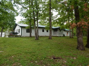 3BR, 2BA home, 1,980 sq.ft, large one car attached garage, fenced yard, carpet, laminate, & tile flooring, large walk-in closet in master, whirlpool tub, walk-in shower, new metal roof & HVAC 2019, new well in 2011, new 30x50 shop building with led lighting, wiring in conduit 220, lots of work benches, 10x10 door, concrete floors, 140 sqft horse barn, fenced area for horses, very private setting mostly wooded 6.36 acres about 3 miles from Berryville.