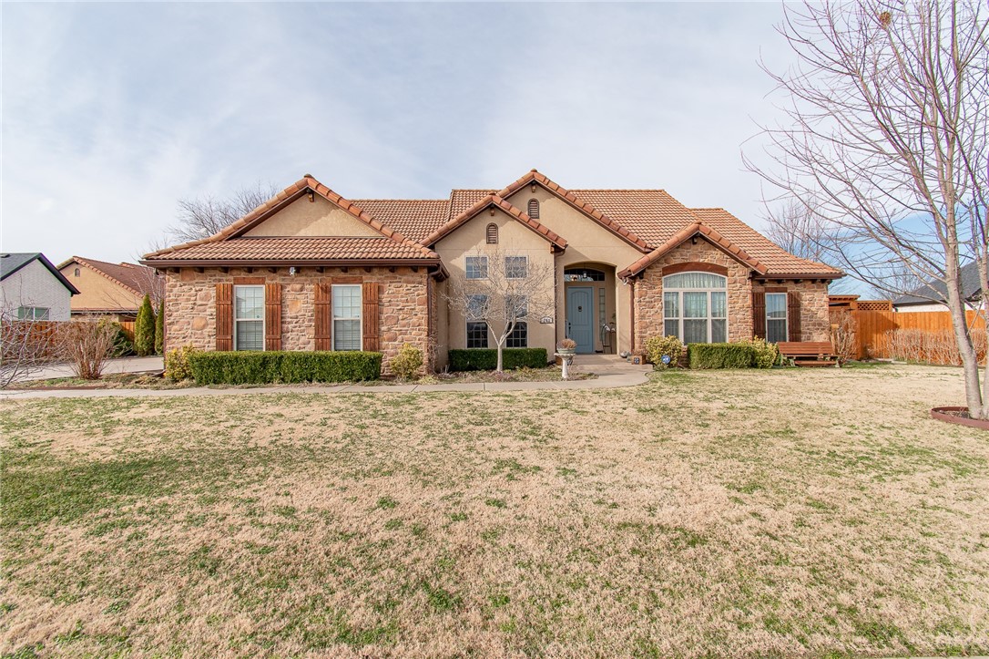 Stunning European home with many unique features. This 4 bedroom, 3 full bath home is located in the Westbrook Subdivision in Springdale. This home features wood beams in the formal dining room, open kitchen/living, Gas Fireplace, 3 outdoor living spaces, and more. The gourmet kitchen features double ovens, antiqued cabinets, counter seating, Gas cook-top, and an eat in kitchen space. The master has a view to the back yard with patio access from the bedroom, large walk-in closet, double vanity, whirlpool tub, and all tile shower. The outdoor living space is your own European getaway featuring a 10x17 covered patio with outdoor kitchen, a large pergola with wood burning fireplace and a separate patio space with hot tub. This home is a must see.