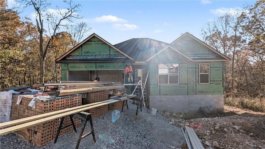 Welcome To Your Next Home! This Solid New Build Brings Style And Comfort Together With A Brick Front, Split 3-Bed Layout, And 9-Foot Ceilings Throughout The Non-vaulted Areas. The Living Room Steals The Show With A Vaulted Ceiling And Striking Beam Accents, Creating A Warm Yet Modern Vibe. The Kitchen Delivers Custom Cabinets, Granite Counters, And An Island With Bar Seating That Flows Right Into A Spacious Dining Area. The Primary Suite Is A True Retreat Featuring Dual Vanities, A Walk-In Closet, And A Full Custom Tile Shower Built To Impress In The Primary Bath. Wood Plank Flooring Runs Through The Main Spaces, With Tile In The Baths And Laundry And Plush Carpet In The Bedrooms Or Get In Early And Upgrade To No Carpet. Step Outside To A Covered Back Deck Overlooking A Future Sodded Yard With Room To Play. Construction Is Just Underway—Which Means There’s Still Time To Make Selections And Add Your Own Style To This Beauty!