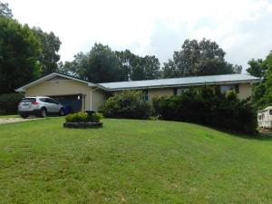 Home, In-ground Pool, and 2.73 acres just outside Harrison barely off Hwy 65 North. All brick home, 3 bedroom 2 baths, living or dining area, kitchen-family room combo with fireplace, basement has 2 large rooms finished with natural wood walls and ceilings great for man-cave or recreation area and bedroom, plus 3rd garage or workshop area with 10 ft wide garage door. Newer items include pool pump and pool painted 2021, new dishwasher 2021, metal roof 2019, and new central heat/air units 2016. Home connected to city water, has well that's not in use. Easy access and quick drive to Harrison only 1.4 miles from Walmart. Owner in process of moving. Call and come see right away!!
