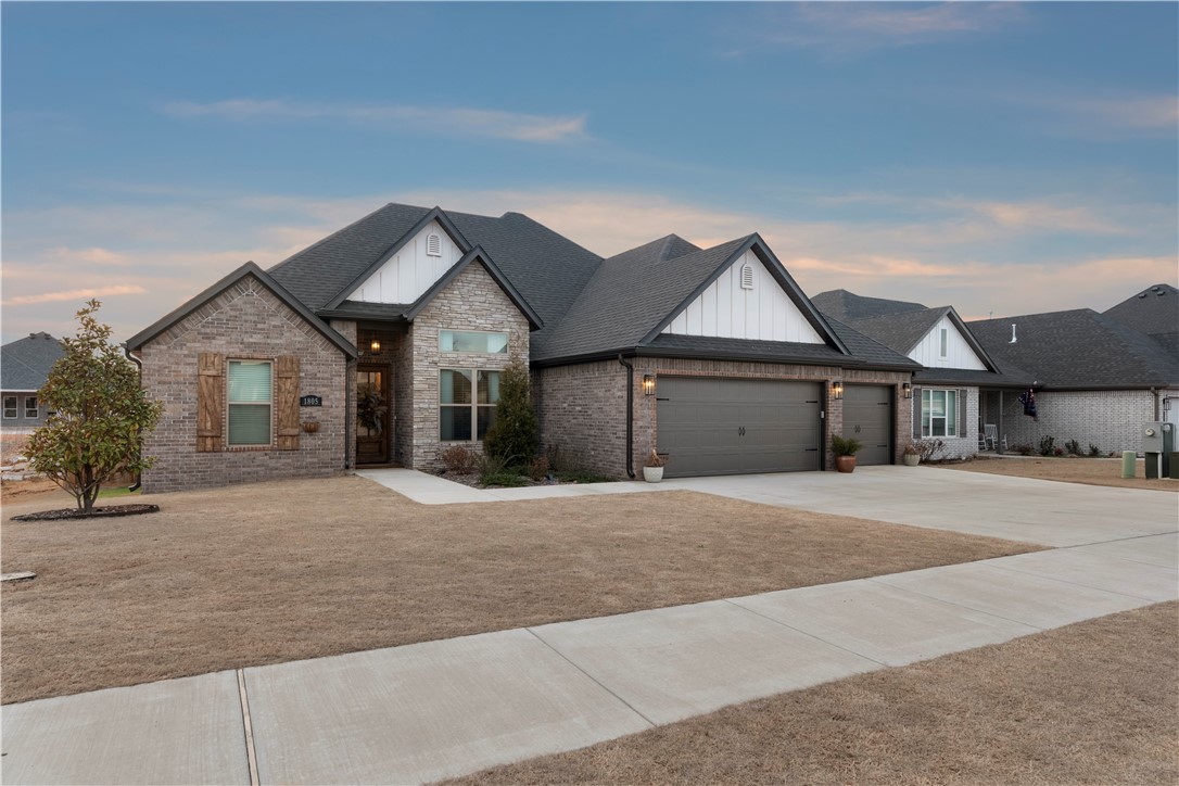 Are you ready to be mesmerized? Meticulously decorated in a spacious layout with a three car garage & a relaxing oasis-like backyard, you'll fall in love instantly with this Pea Ridge home. Upon walking in the front door, you will find an office that can also be used as a bedroom. Around the corner, the core greets you will natural sunlight, updated light fixtures throughout, and breathtaking paint color choices. On one side of the home are two more bedrooms separated by a Jack & Jill bathroom with the primary bedroom on the other side of the home with it's own en suite bathroom with separate bathtub and shower. The half bath and laundry are also on the ground floor. Upstairs you will find a bonus room that could also be used for yet another bedroom if desired. As you walk outside, the back porch feels like a vacation retreat with new covered patio and hot tub that can be purchased separately. Additionally there is a fire pit area all in a fenced yard. $5,000 seller concessions with preferred lender!