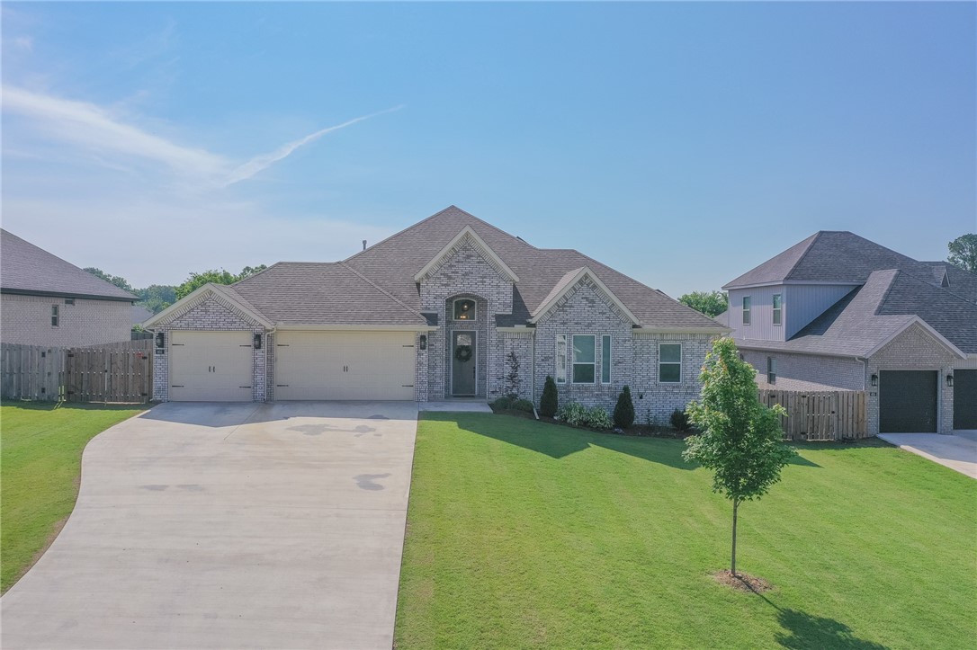 Welcome to your dream home! This stunning 5-bed, 3.5-bath abode on 0.7 acres offers luxurious living. All-brick exteriors, open kitchen/living area, granite countertops, and dual fireplaces. Gourmet kitchen with huge island and walk-in pantry. Primary suite retreat, bonus room upstairs with full bath. 3-car garage. Home is equipped with solar panels for maximum energy efficiency. Schedule a viewing today!