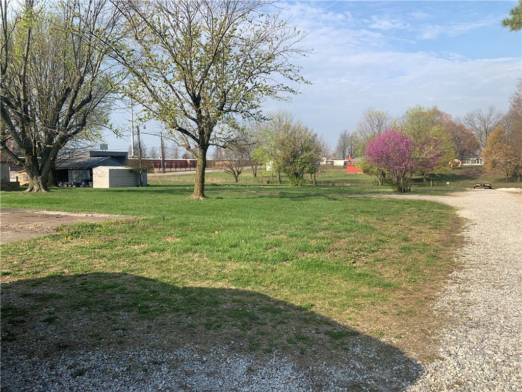 Great commercial corner in excellent location on 48th Street. Total of 1.93 acres+/- with all utilities on property. Street frontage on 2 sides. Rezoned C-5. Survey has been done and also engineering on plat is available. Buildings on property considered of no value.