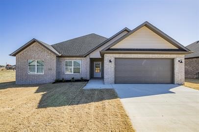 Newer 4 bed 2 bath home located directly behind the new Pea Ridge High School and only minutes from Bentonville! Features include custom cabinets, large kitchen island, upgraded 3cm granite & fixtures, gas cook top with built in oven, wood look ceramic tile floors, custom tile shower, whirlpool tub, raised ceilings, 2'' faux blinds, covered patio, & much more! ***Pictures may not be of exact unit available, paint colors, flooring color, style and cabinets may vary.