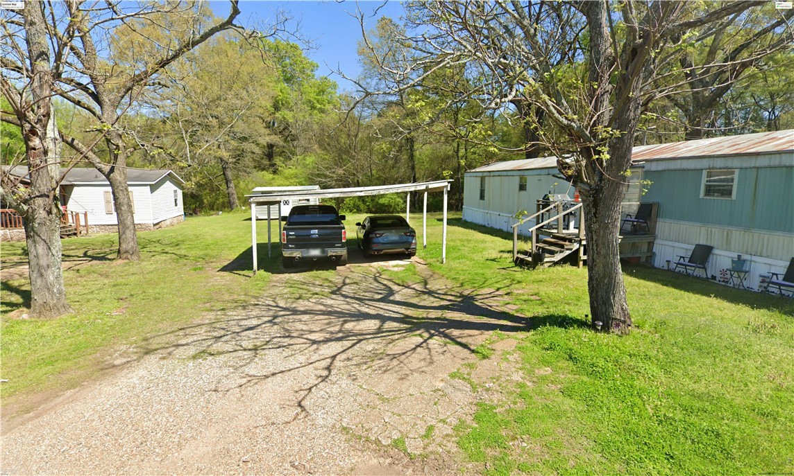 Own a piece of the beautiful city of Hope, AR!
Located in one of the few sections of town where manufactured homes are allowed, this property is within easy walking distance from downtown Hope and everything it has to offer!
Buy it now before it’s gone!
Estimated GPS Coordinates:
SW: 33.661717, -93.580011;
SE: 33.661650, -93.579867;
NE: 33.662083, -93.579850;
NW: 33.662153, -93.579997;