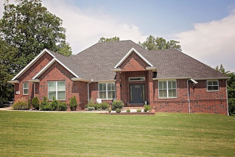 STUNNING CUSTOM HOME IN A DESIRABLE AREA ON 1.09 ACRE LOT IN BENTONVILLE SCHOOL DISTRICT. Luxurious features include 4BD/3.5BA, 3 car garage, designer kitchen, gas cooktop, granite, island, eat-in kitchen, formal dining, wood floors, wood burning insert w/ blowers, oversized master bath, mud room, plantation shutters upstairs, central vac, generator, walkout basement w/ kitchenette & game room, 2 utility rooms, Jack & Jill bathroom, covered deck, community pool, & ample storage w/ lower garage, attic, & several closets.