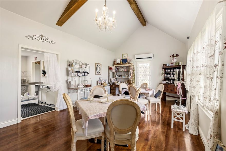 Historic & Remodeled Commercial Property on 4 Acres – Zoned C-2 with Highway Frontage, has 
a Gentry mailing address. The property has been completely remodeled and opened up for business, blending modern updates with timeless charm. Featuring high vaulted ceilings with exposed beams, elegant chandeliers, and an open layout, the space is both welcoming and functional. Local lore says Mr. Highfill himself once lived here, adding historical character to its unique appeal. Previously operated as a baking and tea party business, most of the equipment remains, giving new owners a turnkey start or the freedom to reimagine the space as a boutique, venue, café, or creative workspace. The septic system and grease trap are both just two years old. Gas is available on the property, though it has not yet been connected to the building.  This property offers flexibility, charm, and strong potential in a growing area. Buyer to verify all zoning, utilities, and future development with the Highfill City Planning Department.