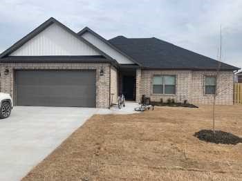 This 4 bed 2 bath home is located directly behind the new Pea Ridge High School and only minutes from Bentonville! Features include high end custom cabinets, large kitchen island, upgraded granite & fixtures, gas range, wood look ceramic tile floors, custom tile shower, whirlpool tub, raised ceilings, 2'' faux blinds, large covered patio, & much more! ***Pictures may not be of exact unit available, fixtures and finish out will be similar***