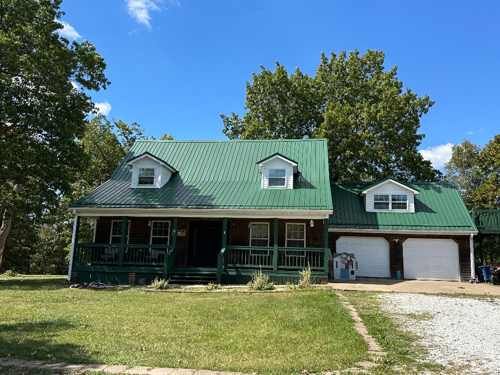 Beautiful two story hobby farm on private picturesque 6.39 acres of partially wooded lot up Gaither Mountain. Large barn, work shop and house that has approximately 2291 sq.ft. House is 4 bedroom, 2 baths, plus large bonus room over the double car garage that has many possibilities (would make a great media/game room). New metal roof in 2021, kitchen with quartz counter tops and hickory cabinets, covered front and back porches, stainless steel appliances, soaker tub and huge master closet. Southwest Boone water.