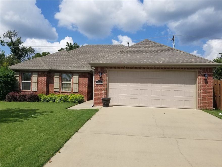 Welcome to this beautiful and well-maintained home just 3 minutes from Elm Tree and Ardis Ann Elementary Schools. Featuring 3 spacious bedrooms and 2 full bathrooms, this home offers a warm and inviting living space with hardwood floors and a cozy living room perfect for family time or entertaining guests. Located in a quiet, clean subdivision, you'll enjoy both comfort and convenience with Walmart Home Office and Walmart Supercenter just 2.6 miles away, and the new Walmart campus only about 3 miles from your doorstep. This home comes fully equipped with a refrigerator, washer, and dryer, saving you time and expense on move-in. For added peace of mind, a storm shelter is included to keep you and your family safe during severe weather.