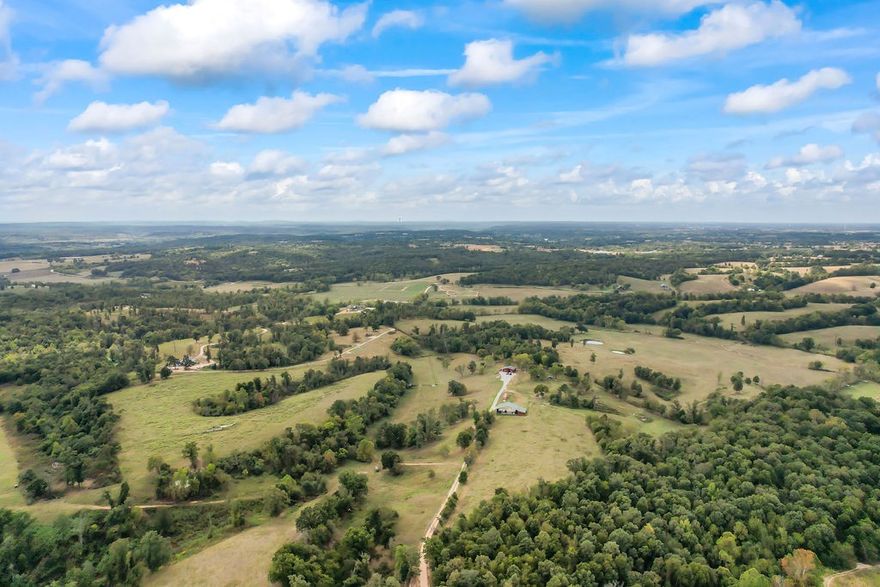 Exquisitely beautiful rolling acreage! Endless possibilities to make your dreams come true with 201 acres. Whether you are looking to build your forever home or make it your prime hunting spot, this one is for you! Gorgeous estate with 1 bed, 1 bath cabin with 24 X 16 attached workshop. Large pole barn provides excellent hay or equipment storage. Privacy and seclusion create your own heavenly retreat that provides fenced pastures and wooded areas. Must see to all this one has to offer! Also listed as Land (MLS# 1287253).