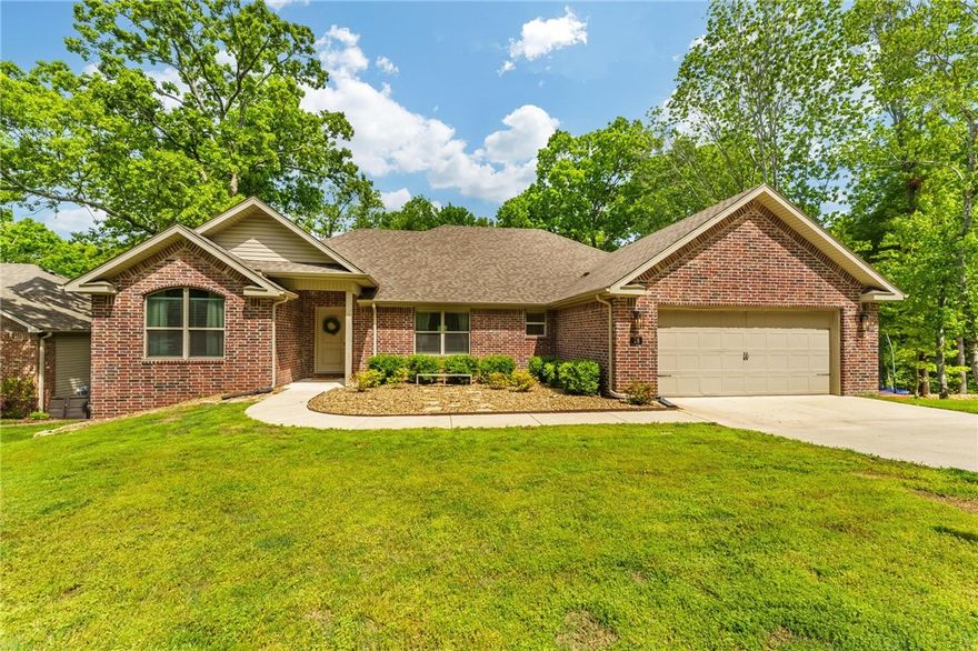 Enjoy the best of Bella Vista with this home conveniently located close to the Metfield Recreation area, Dogwood Golf Course, Back 40 trail system and all the beautiful natural resources of Bella Vista.  The 3 bedroom 2 bathroom split floor plan is designed for comfortable living and enjoying all the natural views.  Located in the Bentonville school district and less than 15 minutes from the new Walmart Home Campus, Crystal Bridges, Alice Walton School of Medicine and the Heartland Whole Health Institute.
