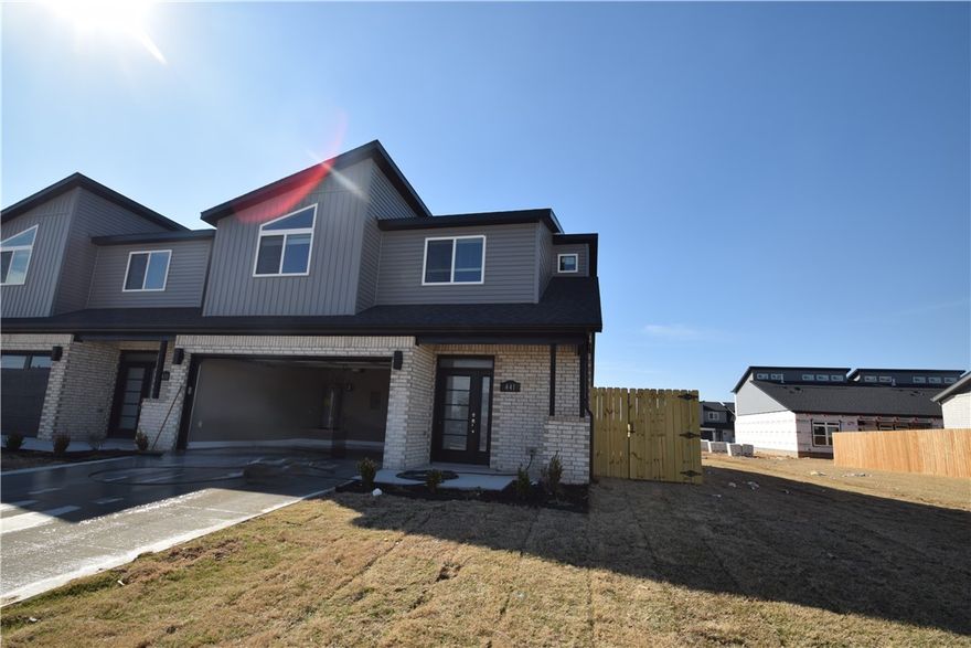 New modern design duplex! Also included brand new side by side stainless refrigerator, washer, and
dryer. This 3 bed 2 1/2 bath plan has an open living concept with tall ceilings and tons of natural light.
Kitchen has granite countertops, stainless appliances, a large pantry, and a gas range. Primary suite is on the main floor and has a beautiful walk-in shower and a large walk-in closet. Two bedrooms upstairs with a full bath and landing area. Wood look tile in the main living areas, 2" faux wood blinds, extra storage in the upstairs attic. Property has a private back patio and wood privacy fence. Owner must approve pets and no smoking.