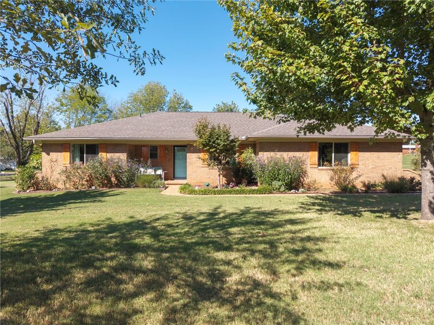 Charming 3-bedroom, 2-bathroom home situated on 0.84 acres in the city. Features brand-new Pella windows, a spacious oversized garage with a storage room and additional storage racks. The laundry area offers plenty of cabinet space. The kitchen includes a black stainless steel built-in oven, a gas countertop stove, and a newer Bosch dishwasher, along with an eat-in area and formal dining space. The master bedroom boasts double closets, and the master bath features a tiled shower. Home was remodeled in 2017. The property includes a level lot and a 14.8x30.9 covered patio added in recent years with roll down shades for evening sun. Home is plumbed for central vac & wired for security. Seller will leave washer, dryer & fridge with acceptable offer. You won't get a chance to have this big of a lot in town! Check it out!