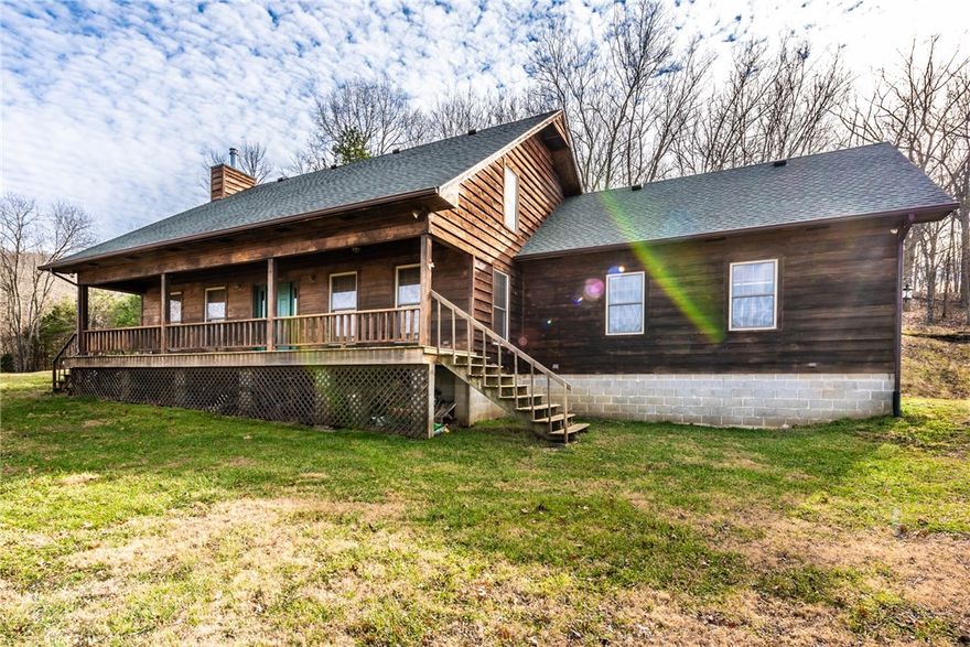 VIEWS VIEWS VIEWS! Enjoy this private country setting with rolling hills at this 3 bedroom 3 bath cedar home located on 10 acres! Relax from the covered front porch or enjoy the property & hunt for deer! Inside you&#x2019;ll find a good spot to cozy up to at the wood burning fireplace or the perfect place to entertain with an open concept living/dining area. You&#x2019;ll have plenty of room to cook in this kitchen with abundant counter space & cabinetry. Features private downstairs master bedroom with master bath complete with his&her vanities. 2 more bedrooms all with built-ins of their own! Plus a BONUS ROOM OR 4th Bedroom! Schedule your showing now! You won&#x2019;t want to miss this one!