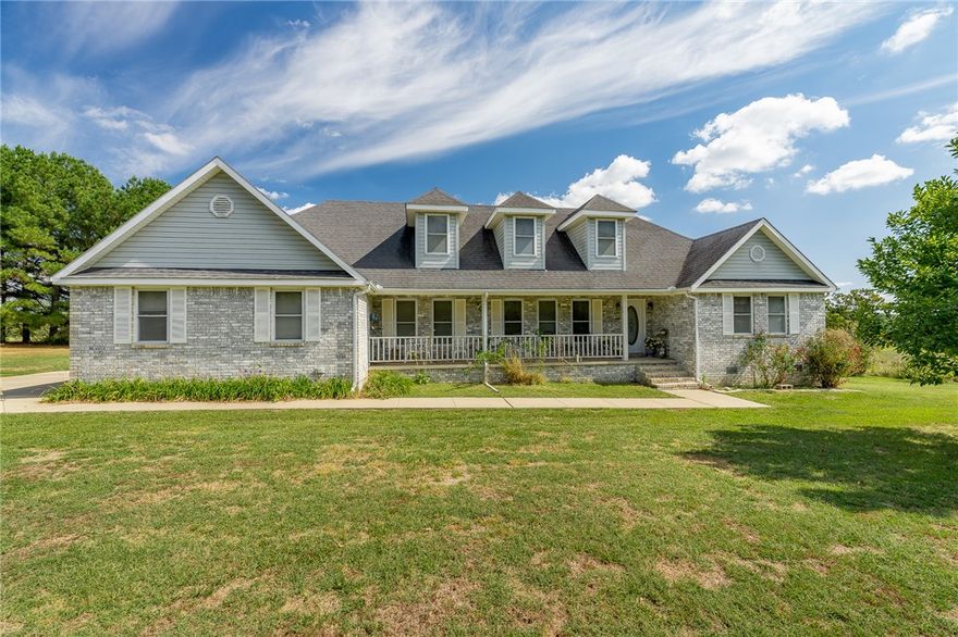 This is a rare find with a custom built beautiful two-story ranch style home with great front porch and twenty gorgeous acres of land that is perfect for a few head of cattle, horses, llamas, or sheep.  The house is in pristine condition and features a spacious living room with wood stove, formal dining room, eat-in kitchen, master bedroom, two guest bedrooms all on the main level.  There is a huge bonus room on the second level.  Lots and lots of storage in this house.  Seller is leaving kitchen refrigerator, washer and dryer.  In addition, there are three outbuildings to complete the small ranch.  Land is flat and has good hay on it too. This was a custom built home and quality construction with 2x6 ‘s and plywood roof decking.  It is one-owner and well-maintained.  There are two new water heaters (2020) and the heat pump was replaced in 2012; roof was replaced in 2011.  Spacious garage and lots of storage. Don't miss the opportunity to see this fabulous home and acreage!