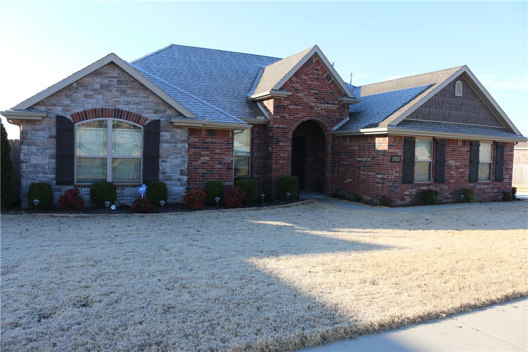 This all brick home is located in a highly desirable neighborhood on a corner lot. It features a sideload garage, open floor plan, wood floors in the living room and laminate in the bedrooms. There are granite countertops in the kitchen and bathrooms. The kitchen has a gas range and large pantry. The master bedroom has two walk-in closets, a double vanity, large whirlpool tub and a tile shower. The back yard is completely fenced in and has a screened in patio and large uncovered deck.