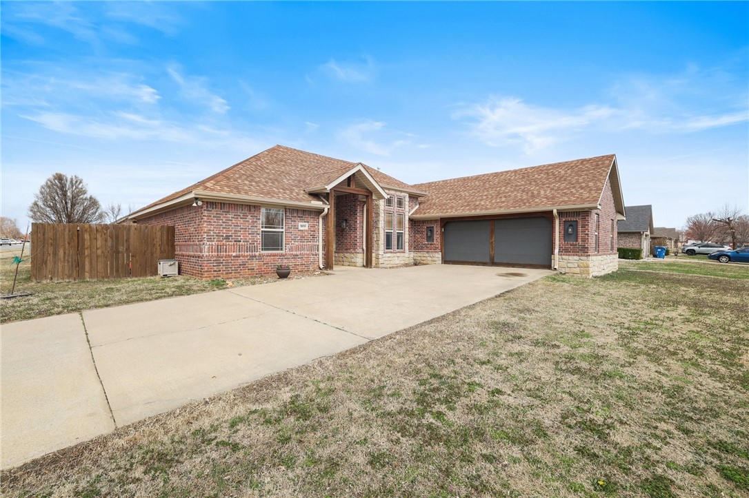 Stunning Home in Prime Bentonville Location!
This beautifully designed home features an split floor plan, luxury flooring, tray ceilings, and crown molding throughout. The spacious living room offers a cozy gas log fireplace, built-in surround sound, and access to a private back patio—perfect for entertaining. A dedicated office provides the ideal work-from-home space, while the kitchen shines with granite counters, pantry, and new appliances. The main suite includes dual sinks, a walk-in closet, and a Jacuzzi tub. Roof and water heater replaced in 2023. Extras: wireless garage keypad, outdoor TV hookup, and no HOA fees. Conveniently located just 10 minutes from the new Walmart HQ, Downtown Bentonville, and XNA Airport.