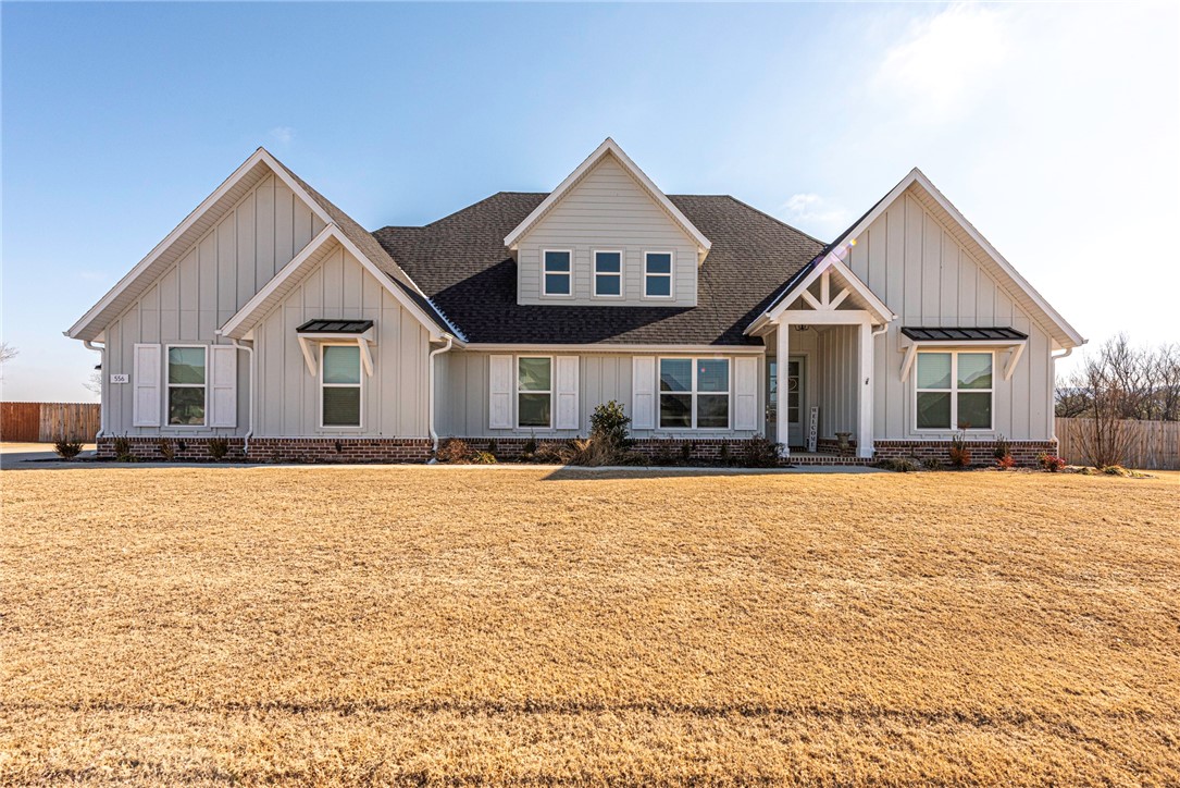 WELCOME HOME! This immaculate 4 bedrm 3 bathrm home on 0.95 acres +/- located between Farmington and Prairie Grove is minutes away from Shopping, eateries, schools, & parks! From the covered front entry head into the open concept living room featuring, wood flooring, crown molding, and gas log fireplace. From the open concept living room flow into the spacious eat-in kitchen with stainless steel appliances, white cabinetry, Apron sink, white subway tile backsplash, & a large center island with room for seating! Enjoy an office/ flex space with wainscoting details & French doors! Relax and rejuvenate in the primary bedroom with private ensuite feat: dual sink vanity, soaker tub, walk in shower, and walk in closet. Enjoy an additional three bedrms, one full bathrom, & a Jack&Jill bathrm! Head out back to the covered back patio overlooking the oversized fenced back lawn perfect for the upcoming spring and summer months! **Seller is offering $1,000 flooring allowance for carpet replacement** Don’t miss out! Act Now!