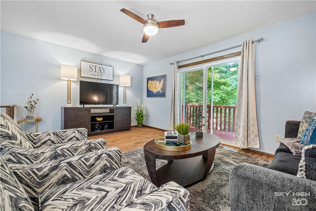 Welcome To Your Next Investment (Or Your Next Home)! This Two-Level Townhouse Comes Fully Furnished, Fully Stocked, And Fully Operational As A Short-Term RentalāNo Startup Headaches, Just Step In And Go. The Updated Layout Flips The Script With Living, Kitchen, Dining, And A Handy Half Bath Upstairs, While The Lower Level Hosts 2 Bedrooms, A Full Bath, And Laundry. One Bedroom Connects Directly To The Bath For Extra Convenience. Outdoor Living Is Covered With A Deck Off The Living Room And A Patio Off The Main Bedroom. The Location Is Spot-On: Kingswood Golf Course Just Down The Street, Along With A Pool, Playground, Mini Golf, And Tunnel Vision Trail Access. Guests Love The Easy Hop Back To 71B, With Restaurants And Shopping Just Minutes Away. Whether Youāre Adding To A Portfolio Or Jumping Into STRs For The First Time, This Oneās A Plug-And-Play Winner With All The Fun Things Already In Place.