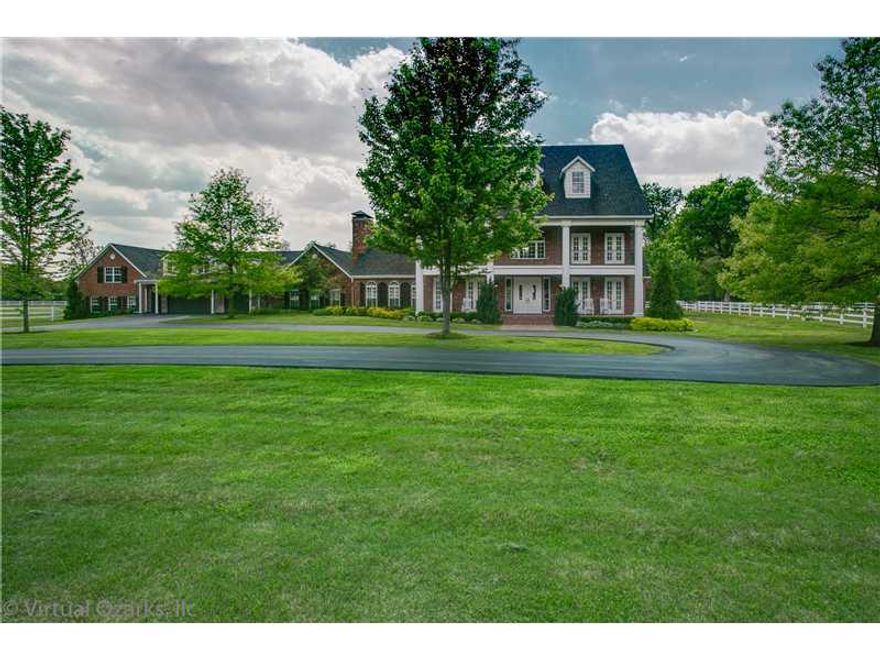 ESQUISITE PROPERTY. ONE OF THE FINEST YOU WILL EVER SEE. UPDATED W TOP OF THE LINE QUALITY & AMENITIES. INCLUDES MODEL HOME FURNISHINGS. 40 ACRES W GENTLEMENS FARM FOR FAMILY HORSES & COWS. BARN, RIDING GROUNDS, POOL, FULL BASKETBALL & VOLLEYBALL COURTS.,SURROUNDED BY 17 ACRES OF WOODS AND 23 ACRES OF PASTURE, ALL COMPLETELY FENCED. HUGE INDOOR GYM, PRIVATE GUEST APT W FULL KITCHEN. OVERSIZED MUDROOM, CRAFT ROOM, 2 BONUS AREAS, 2 LAUNDRY ROOMS. GORGEOUS MASTER SUITE. UPSTAIR BEDROOMS W WALKOUT PORCHES.