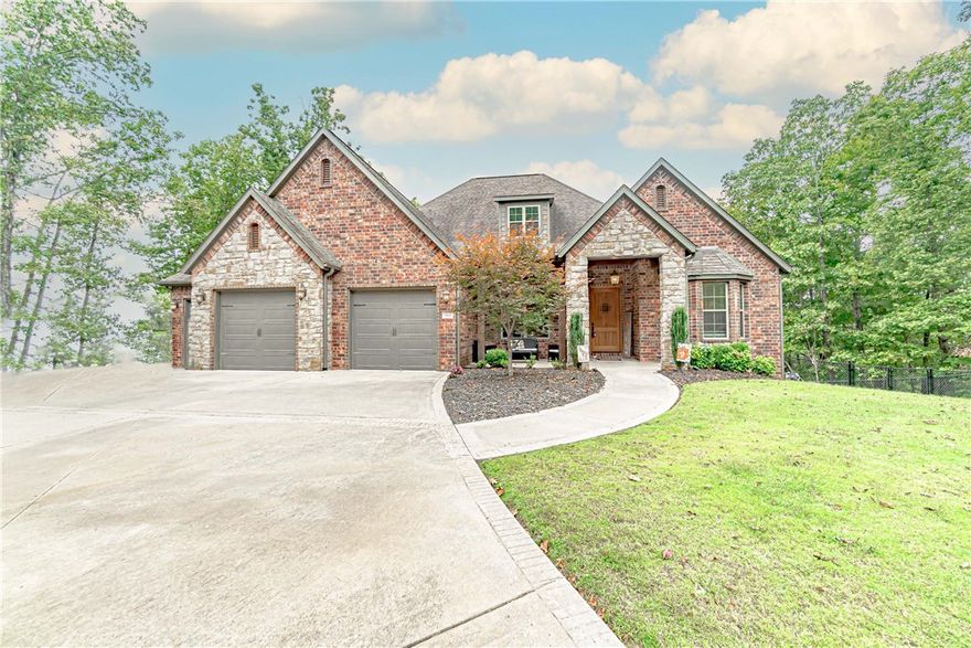 Stunning brick and stone cover this European beauty w cozy front porch, expansive covered decks. Basement covered patio has outlet to service a hot tub. Kitchen with granite and waterfall marble, a sep veggie sink, electrolux apliances, and updated pendant lighting. This all overlooks a wall of windows in living area with gas FP and beautiful wooded view of almost 2 acres. Primary bedroom on main with enormous shower w 2 shower heads and a rainshower. Custom closet w builtins connect to mudroom/laundry. Hallway with cubbies and pantry.Another bed and full bath plus an office with french doors are on main floor. w primarily hardwood floors. The basement has a custom built full bar, 2 wine fridges, ice machine, pool table, media room area, projector and screen. 1/2 bath for guests, 2 bedrooms and jack and jill bath. 506 sf storage heated/cooled to total 4485 sf and plumbed for add bath. 1 boat slip at comm dock WITH a lift. Side x side in garage, wash/dryer/fridge, and deer stands convey with acceptable offer.