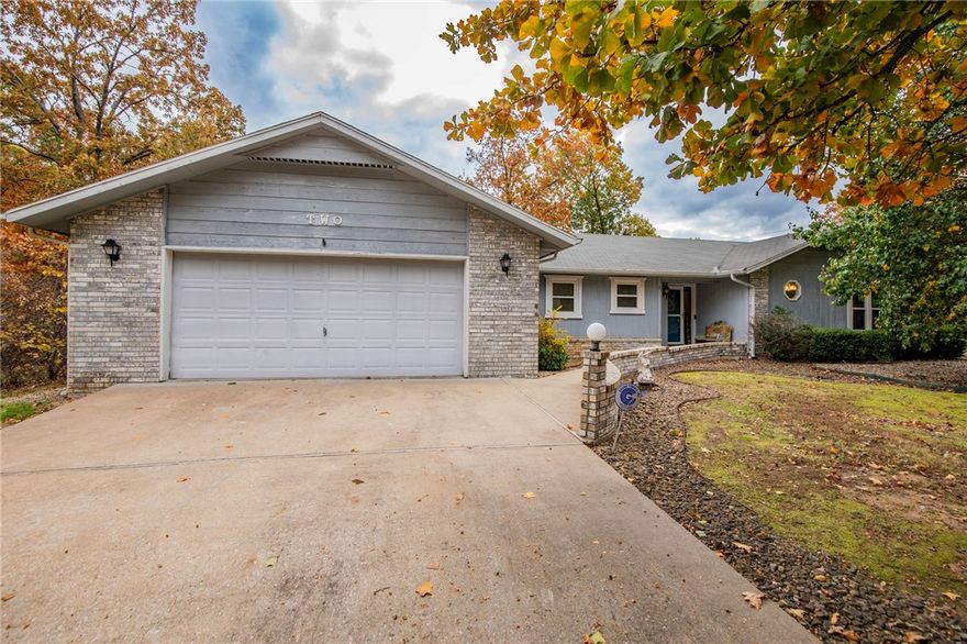 Welcome Home!
This beautifully maintained property offers comfort, space, and convenience — all in one! Featuring 2 spacious bedrooms, 2 full baths, and a versatile flex room perfect for an office, hobby space, or guest room. Enjoy relaxing in the bright sunroom, the ideal spot for morning coffee, plants, or a cozy reading nook.

Recent updates give you even more peace of mind, including a new AC unit and a recently pumped septic system. The home sits on a large, level lot shaded by mature trees, creating a peaceful and private setting. Located less than 2 miles from I-49, you’ll enjoy quick access to Northwest Arkansas’ best shopping, dining, and attractions. 

Don’t miss your chance to own this well-loved home. Schedule your showing today!