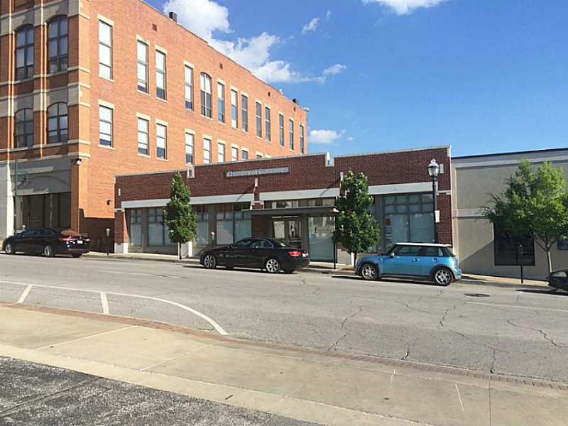 RARE OPPORTUNITY to own an important piece of fayetteville history. Located just off the square. Beautiful brick facade with 80' frontage on W Mountain St. 6,000 SF of professional office space, conference rooms and a work room.