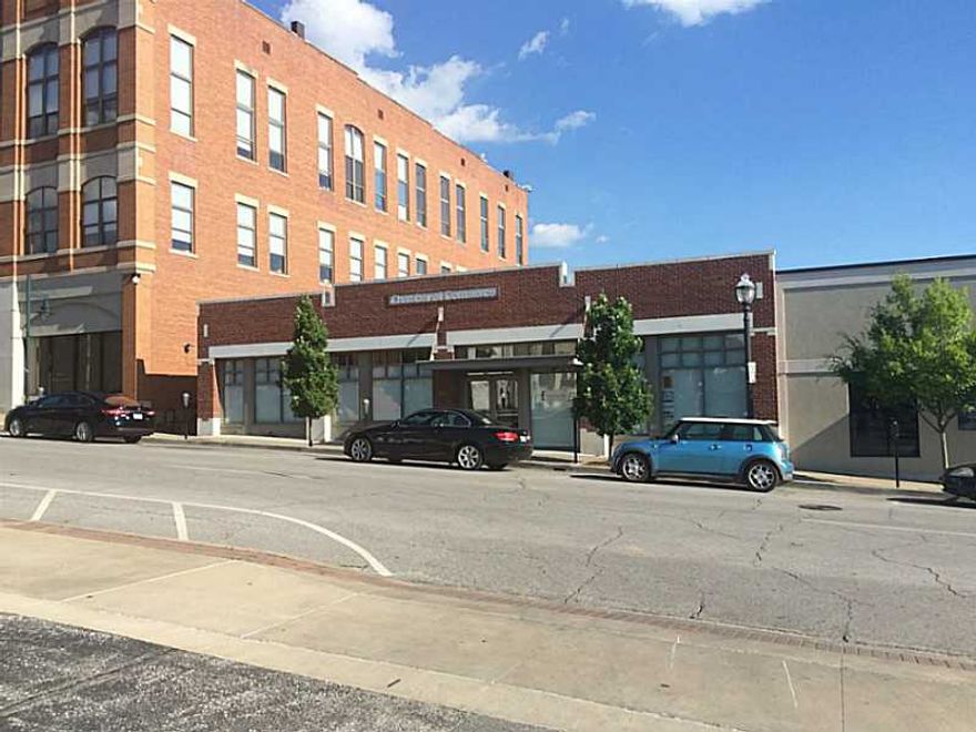RARE OPPORTUNITY to own an important piece of fayetteville history. Located just off the square. Beautiful brick facade with 80' frontage on W Mountain St.   6,000 SF of professional office space, conference rooms and a work room.