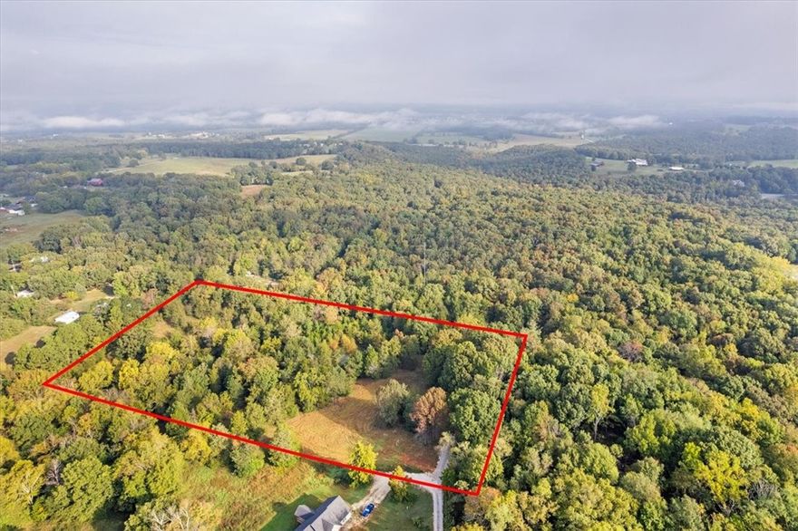 Beautiful property in Fayetteville Public School District! Tract 3 offers 7.68 acres with a lovely building site to build your dream home & enjoy wildlife from your front door...New culvert just put in across drive. Truly a park-like setting that's partially wooded, including a pond & a creek. Be sure to cross the creek & explore more open land on the opposite side. Water tap paid for and electricity is at the drive.  Close to Fayetteville with a peaceful, serene setting. You don't want to miss this one! Look for sign at the road