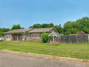 Calling all FAMILIES...This cozy home on the outskirts of Russellville is ready for your family. This home offers new flooring, fresh paint, and an added bonus room that could be an extra bedroom, playroom, or office! The house has a new roof, central air unit, water heater, and dishwasher. With 3 bedrooms and on a corner lot this is great home for new families!