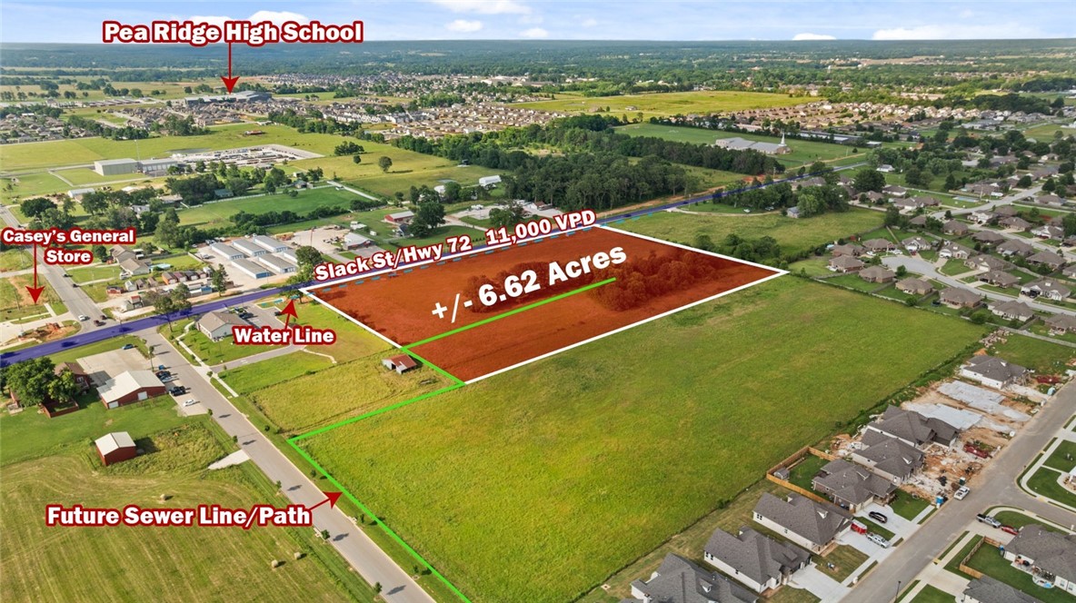+/- 6.62 acres of level, cleared land right off Slack St/Hwy 72 in Pea Ridge, with approx. 720' road frontage and about 10,000 VPD for high visibility. Zoned C-1 Neighborhood Commercial, this prime location is ideal for a bank, medical or general office building, retail space, or restaurant. Situated near the upcoming Casey's General Store, this property is in a thriving area. Pea Ridge is one of Northwest Arkansas' fastest growing cities, with over 400 building permits issued in 2023, surpassing even Springdale, AR!